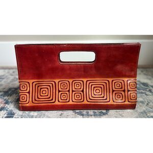 Women's Rust Colored Embossed Leather Labyrinth Design Top Handle Bag